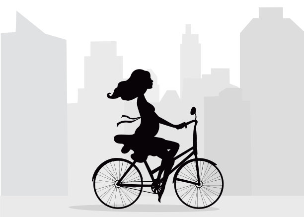 孕妇骑自行车在城市背景图片下载