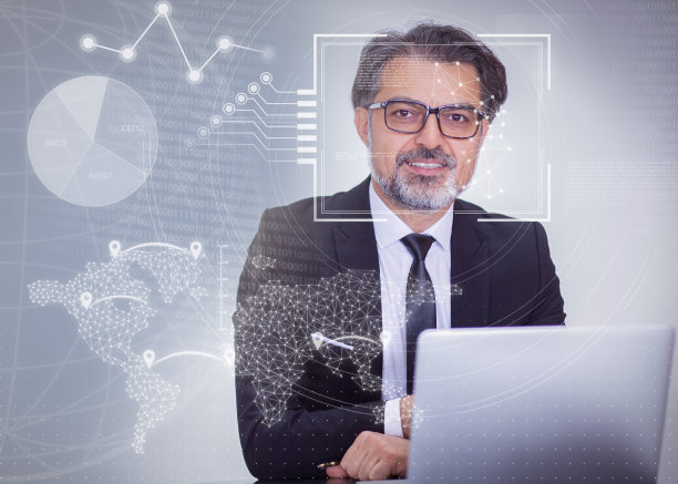 男人坐着，拿着笔记本电脑和虚拟身份识别图形图片下载