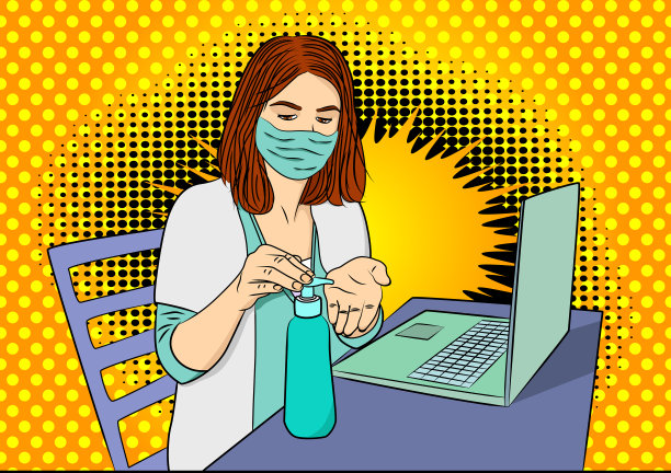 女医生在使用笔记本电脑之前消毒她的手素材图片