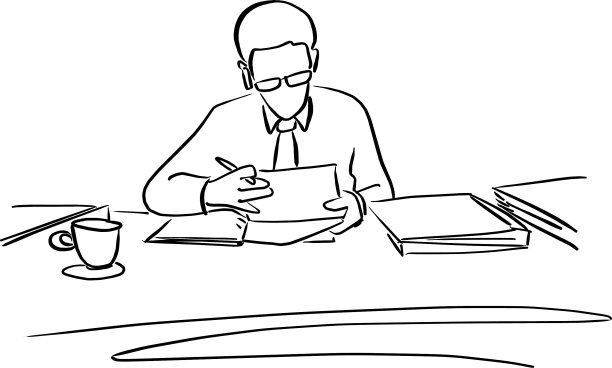 一个戴眼镜的商人在办公桌上工作图片下载