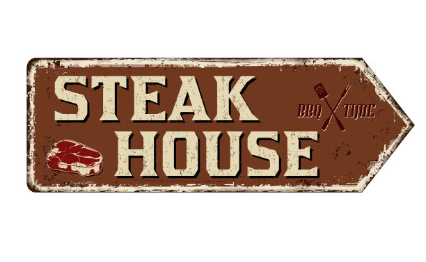 牛排馆陈旧生锈的金属标志图片下载