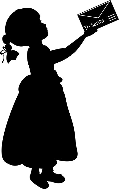 剪影的孩子抱着圣诞老人的信图片下载