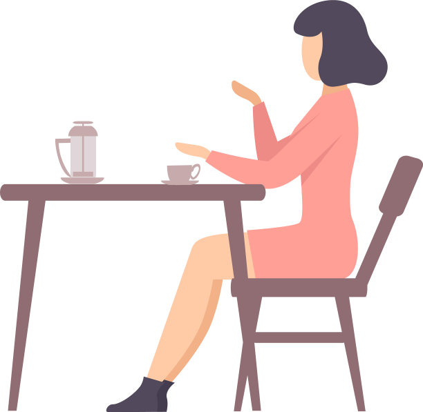 穿粉红色衣服的女人坐在桌子旁图片下载