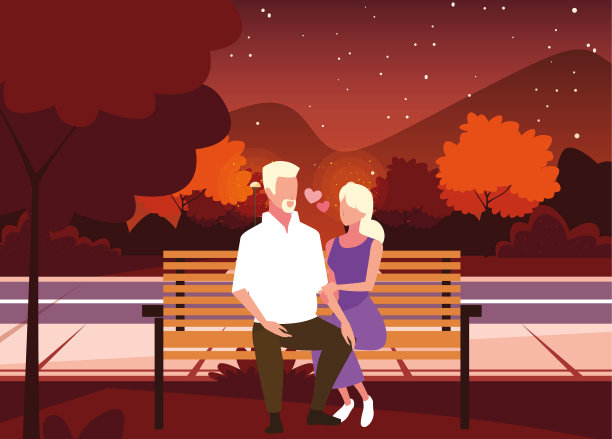 一对夫妇坐在公园的椅子秋天图片下载