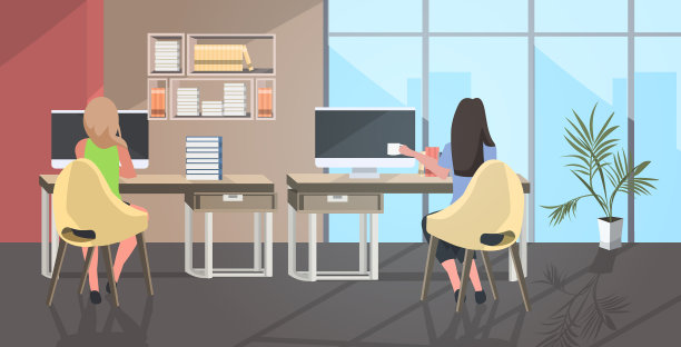 一对女商人坐在办公桌旁图片下载