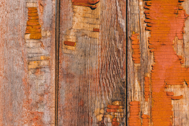 木制的旧橙色栅栏。图片下载