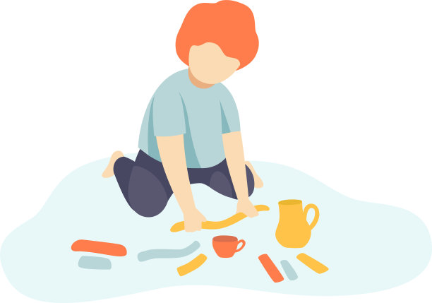 小男孩坐在地板上做数字图片下载