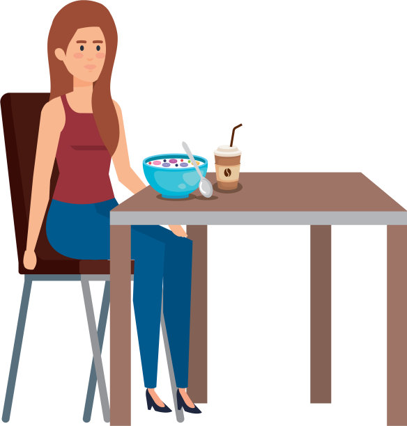 年轻女子在餐桌上吃饭图片下载