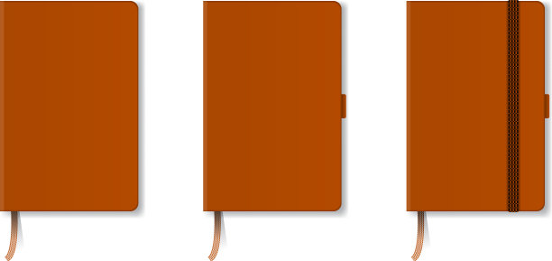 橙色现实的硬封面笔记本与红色图片下载