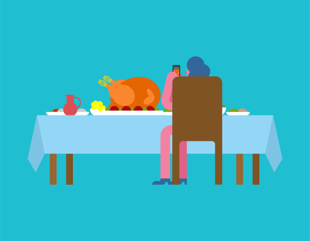 感恩节女人在桌子上拍火鸡图片下载