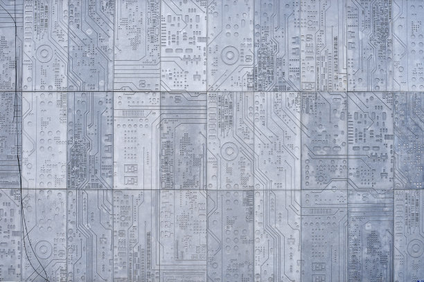 纹理的石墙与雕刻图案的电脑电路板图片下载