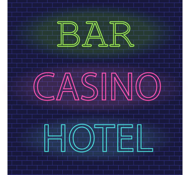 砖墙上酒店赌场酒吧的霓虹灯招牌图片下载