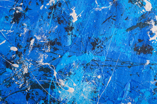 照片的创意纹理背景在蓝色，黑色和白色垃圾色，油漆和飞溅滴背景图片下载