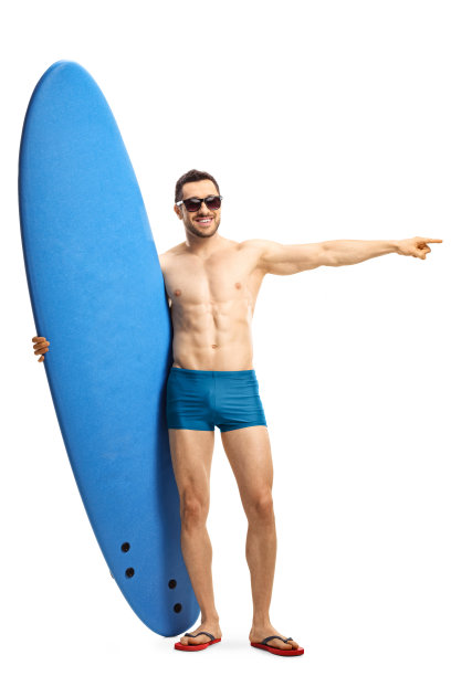 一个穿着泳衣戴着墨镜的男人拿着冲浪板指着一边图片下载
