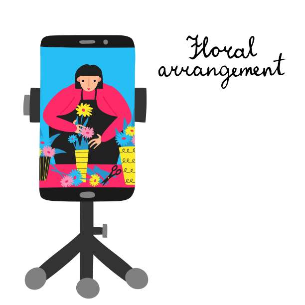 插花艺术的迹象。三脚架上的手机。图片下载