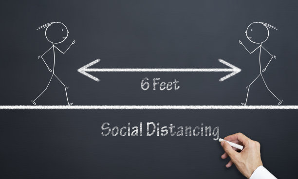 人与人之间社会距离的概念。两个人之间6英尺的距离。图片下载