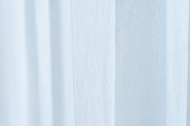 散射光的透明窗帘。织物纹理图片下载