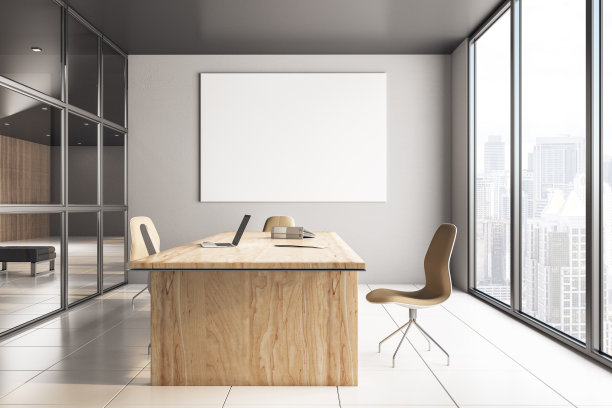 设计师的桌面，墙上挂着空白横幅图片下载