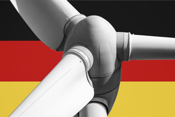 风力发电机转子与德国国旗的背景图片下载