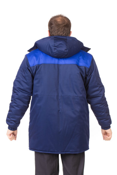 穿蓝色工作服的工人。从后面看。图片下载