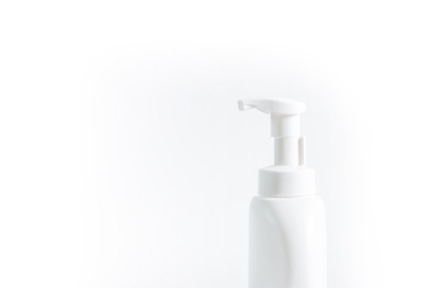 酒精凝胶从泵瓶白色背景。COVID-19疫情感染防控。卫生保健概念图片下载