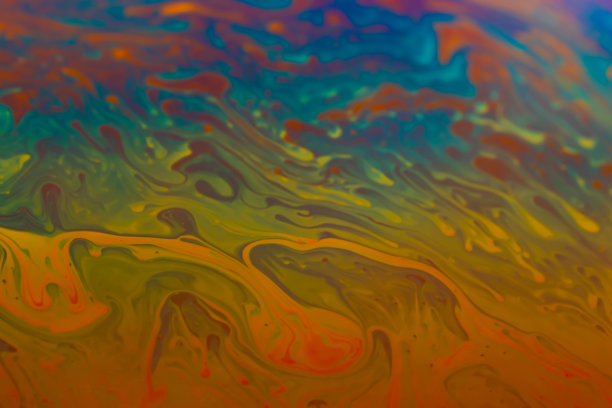 抽象背景彩虹色涂料，在暖色彩虹色干扰下图片下载