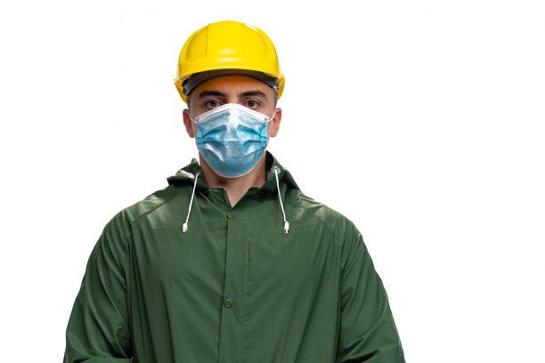 白色背景上的年轻男性工程师、工人或建筑师的肖像图片下载