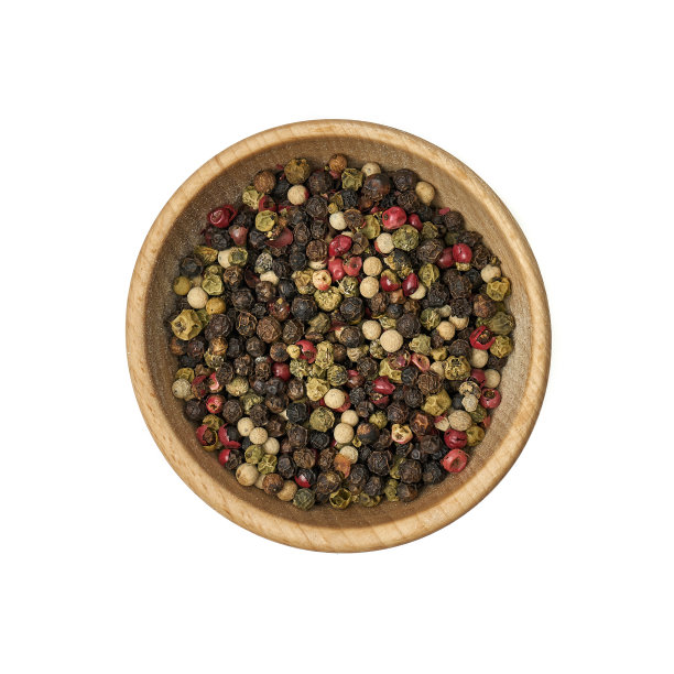 彩色的胡椒粉放在一个木碗里图片下载