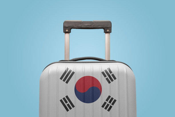 行李与韩国国旗印刷旅游度假概念。图片下载
