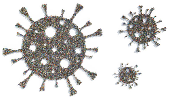 形成不同大小病毒形状的人员组的俯视图图片下载