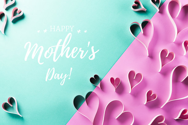 母亲节快乐，妇女节或情人节问候概念。粉彩背景与粉红色的心和“母亲节快乐”文本，平铺图案。图片下载