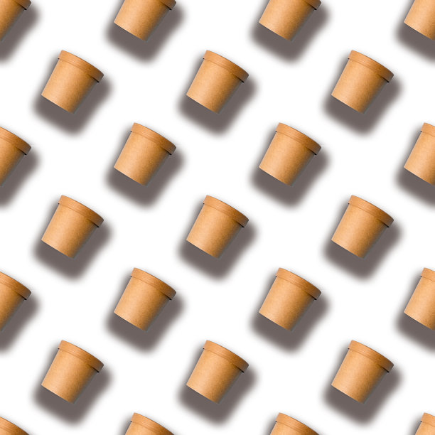 一个无缝模式的棕色纸杯孤立在白色背景。图片下载