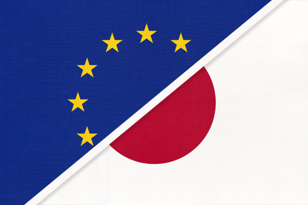 欧盟或欧盟和日本国旗纺织品。象征欧洲委员会协会。图片下载