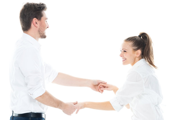 白人男性商人穿着西装在白色背景前跳舞图片下载