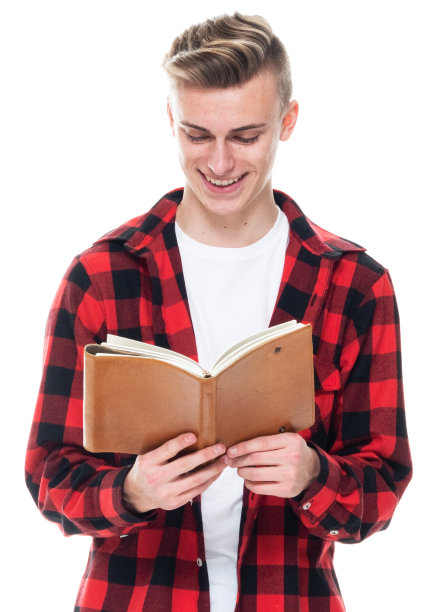 白人男学生前面的白色背景穿着纽扣衬衫和拿教科书图片下载
