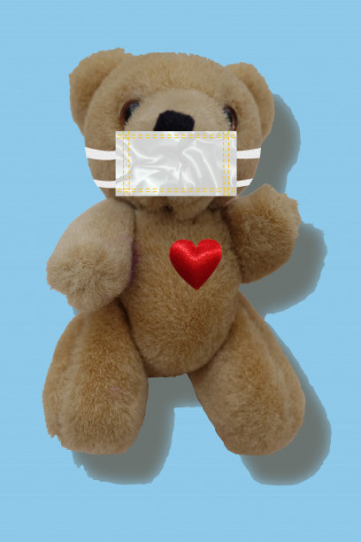 带防护面罩的泰迪熊健康药图片下载