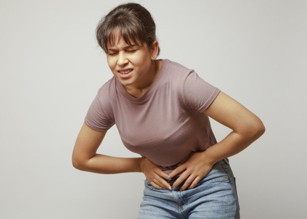 年轻女子胃痛图片下载