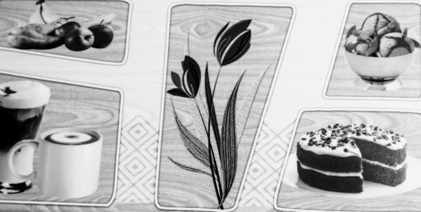 花和水果形状瓷砖上和白色前景。墙面装饰用黑白瓷砖。图片下载