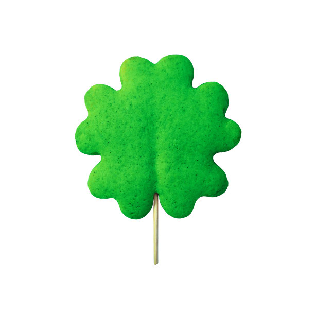 圣帕特里克节三叶草曲奇孤立在白色背景。绿三叶草曲奇棒图片下载