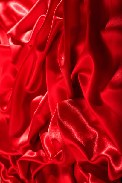 红色丝绸布背景，光滑有光泽的纺织材料图片下载