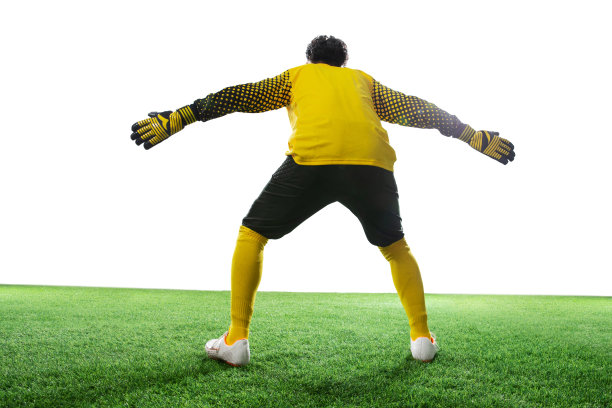 守门员张开手臂站着球场上图片下载