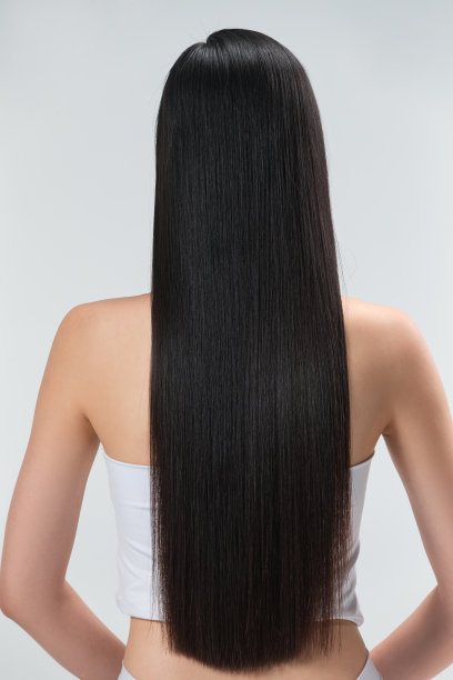 青年女人亮丽丝缎般的头发图片下载