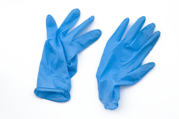 Covid-19一次性污染手套。冠状病毒乳胶塑料垃圾图片下载