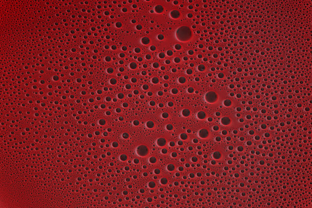 特写宏血，血腥的气泡，血红色液体，背景，纹理图片下载