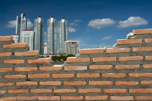 在建筑中砌砖的墙在背景上图片下载