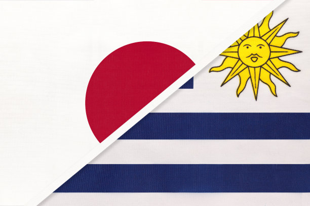 日本和乌拉圭，象征两国国旗。亚洲和美洲国家之间的关系。图片下载