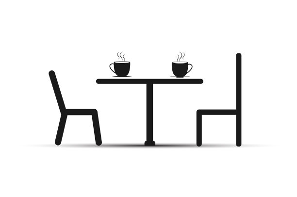 椅子和桌子上放着一杯茶图片下载