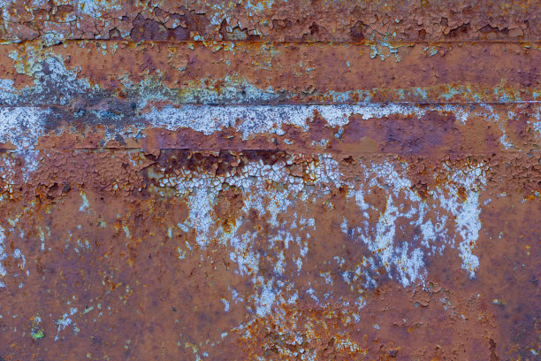 生锈的背景，生锈，生锈的旧铁的纹理。金属上覆盖着红棕色的锈。图片下载