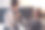 一张母亲在床上给儿子系领带的特写照片图片下载