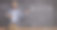 数学老师拿着书，指着写有公式的黑板图片下载